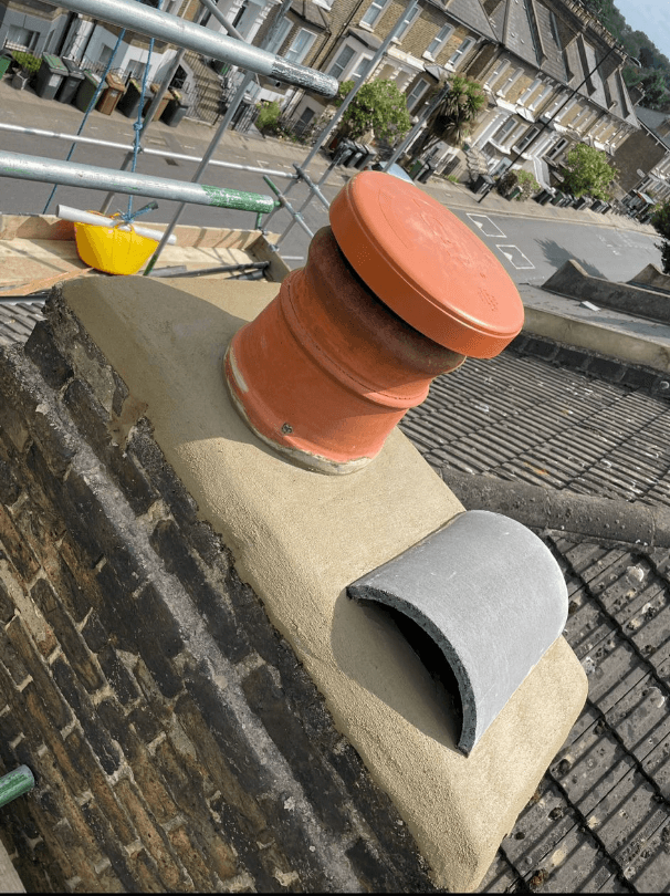 Chimney Strip and Rebuild with New Ridge and Chimney Pot